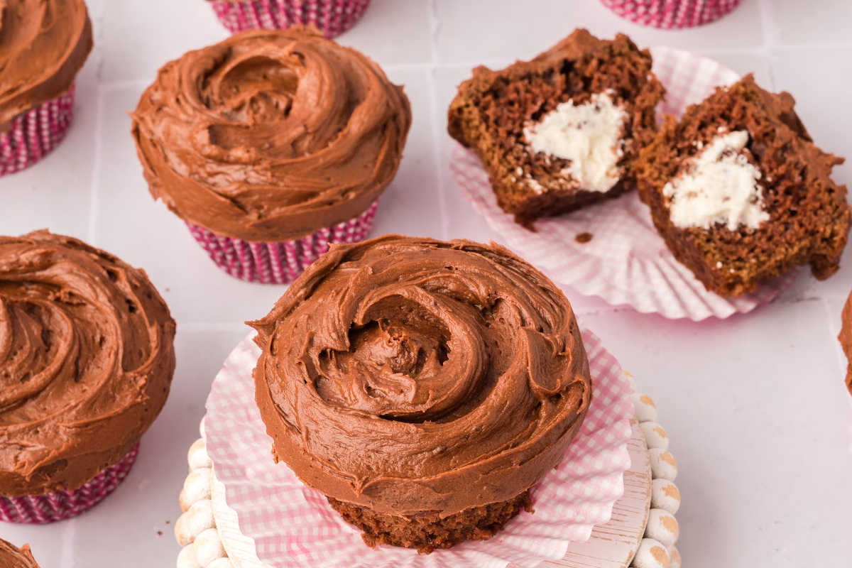 finished cupcake on counter split in half.