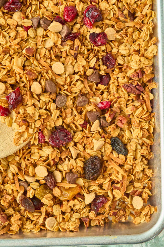 rimmed baking sheet with finished granola.