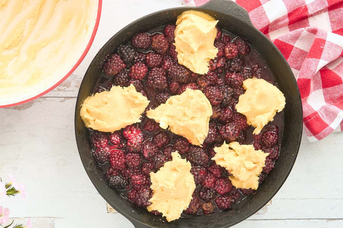 cooked filling topped with scoops of cookie topping.