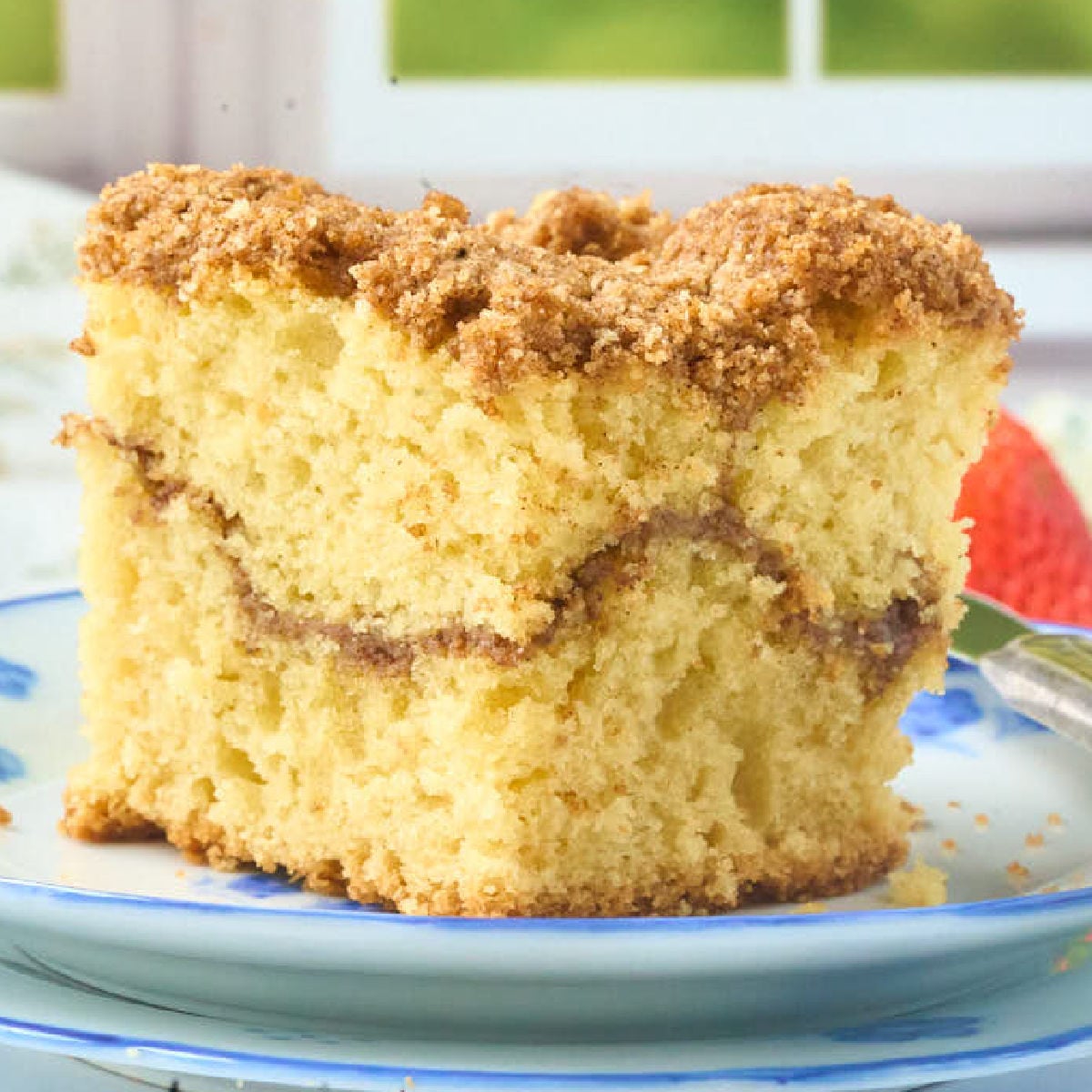 slice of sourdough coffee ccakke with streusel topping.