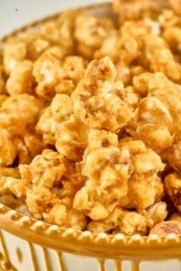 close up view of caramel popcorn in bowl