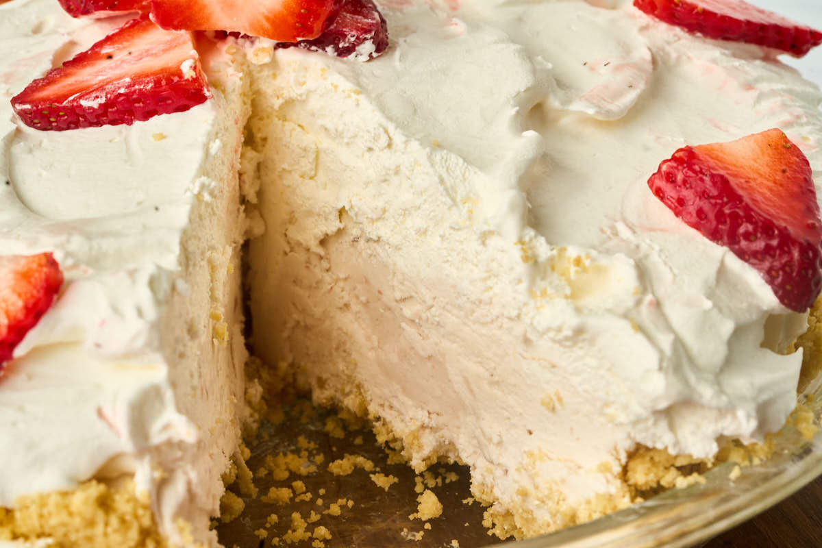 close up view of finished pie with missing slice.