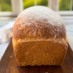 baked loaf of bread dusted with flour.