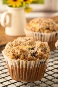 cooling rack with blueberry muffins.
