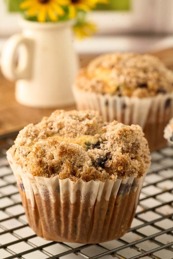 cooling rack with blueberry muffins.