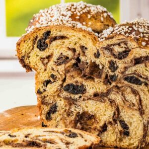 close up view of sugar topped bread with swirled chocolate.