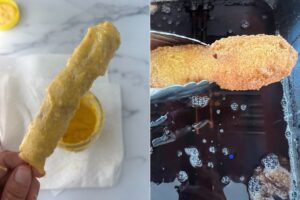 corn dog dipped in batter and being fried