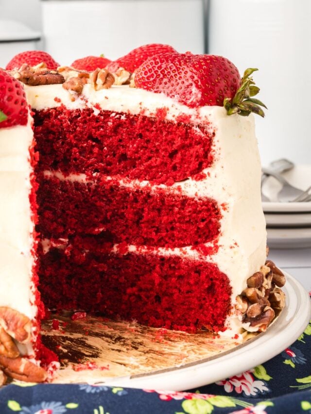 slices cake showing layers of icing.