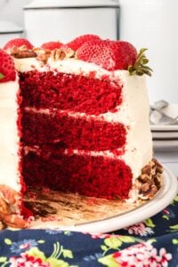 slices cake showing layers of icing.