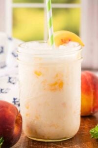 close up view of creamy peach drink.