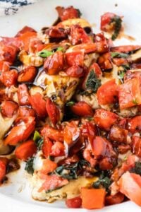 close up view of smoked mozzarella and bruschetta chicken.