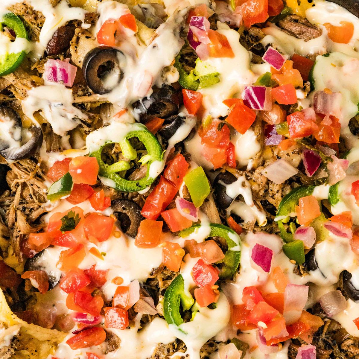 close up view of finished nachos.