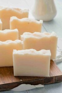 shea butter soap finished on blue wood board