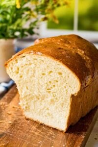 close up view of cut loaf of fluffy buttermilk bread.