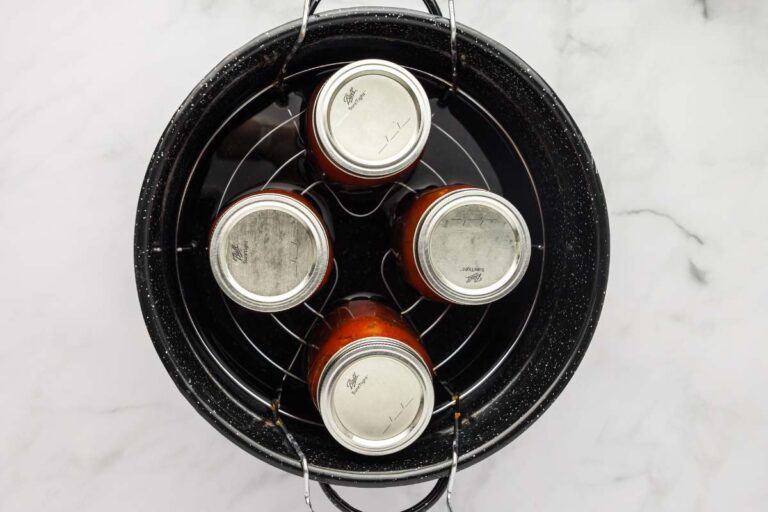 canner with pint jars of homemade salsa.