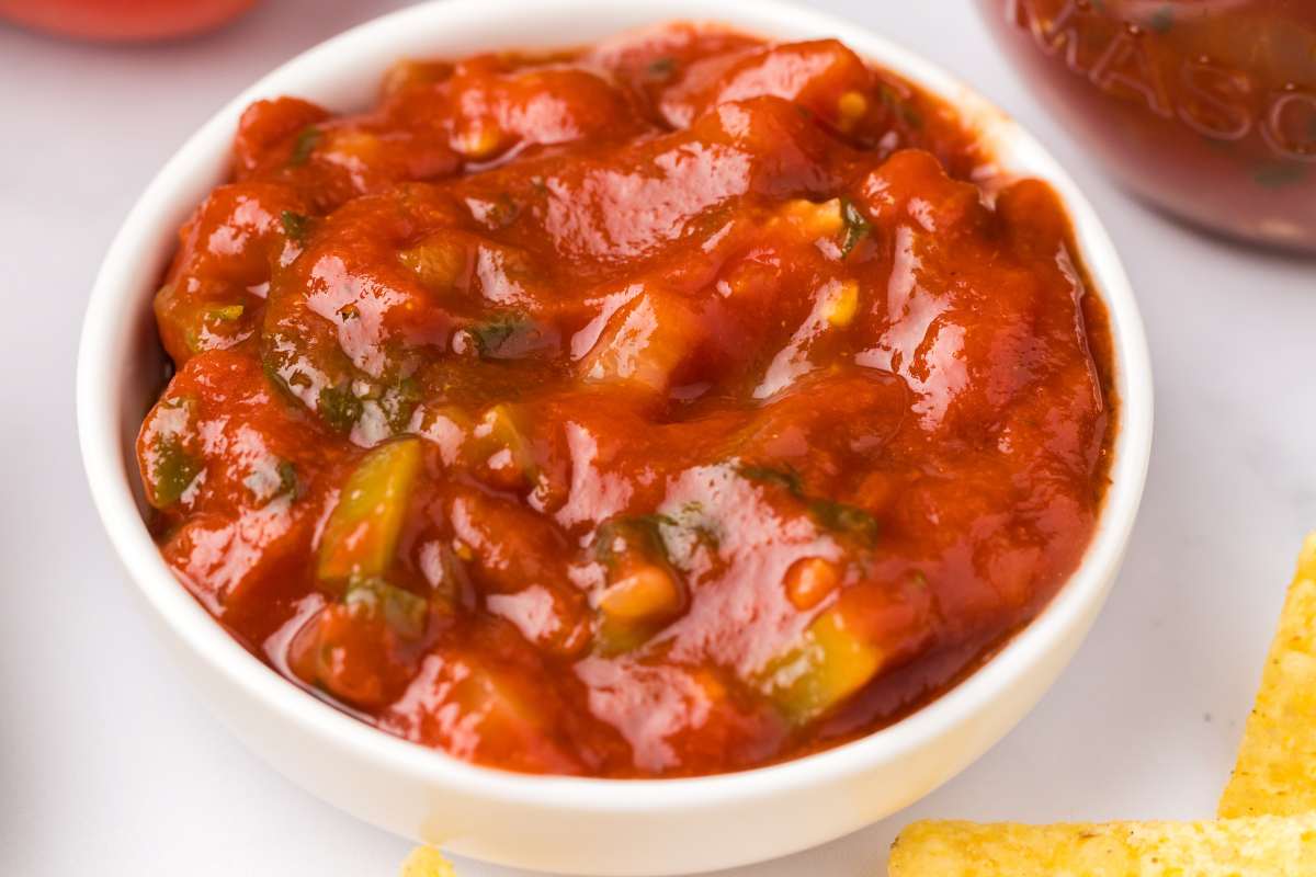 finished salsa in small serving bowl.