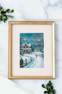 framed christmas watercolor on marble background.