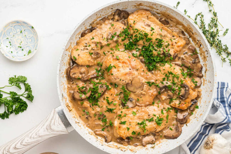 finished pan of chicken marsala with parsley.