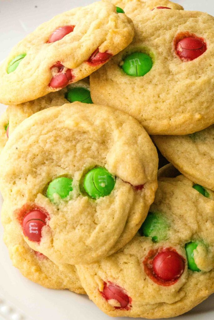 plate of christmas m and m cookies.