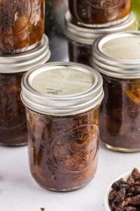 stacked mason jars of homemade apple chutney