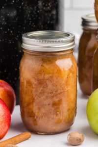 Multiple jars of the completed Classic Homemade Applesauce, sealed and labeled, symbolizing the satisfaction of a canning job well done.