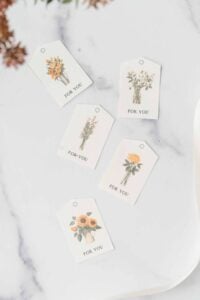 5 pretty tags on counter.