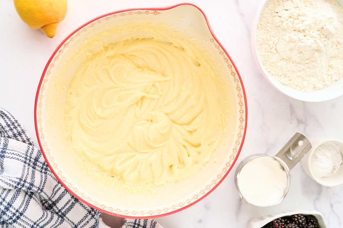 butter sugar and eggs beaten bowl.