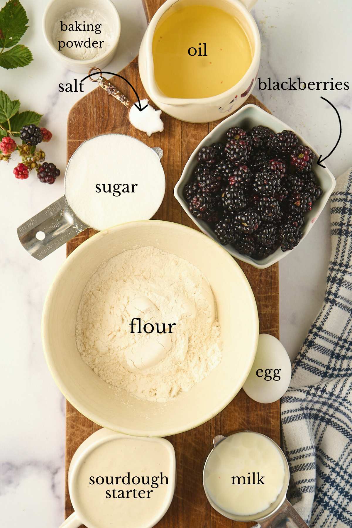 labeled ingredients on marble counter.