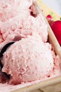 homemade strawberry ice cream in loaf pan.