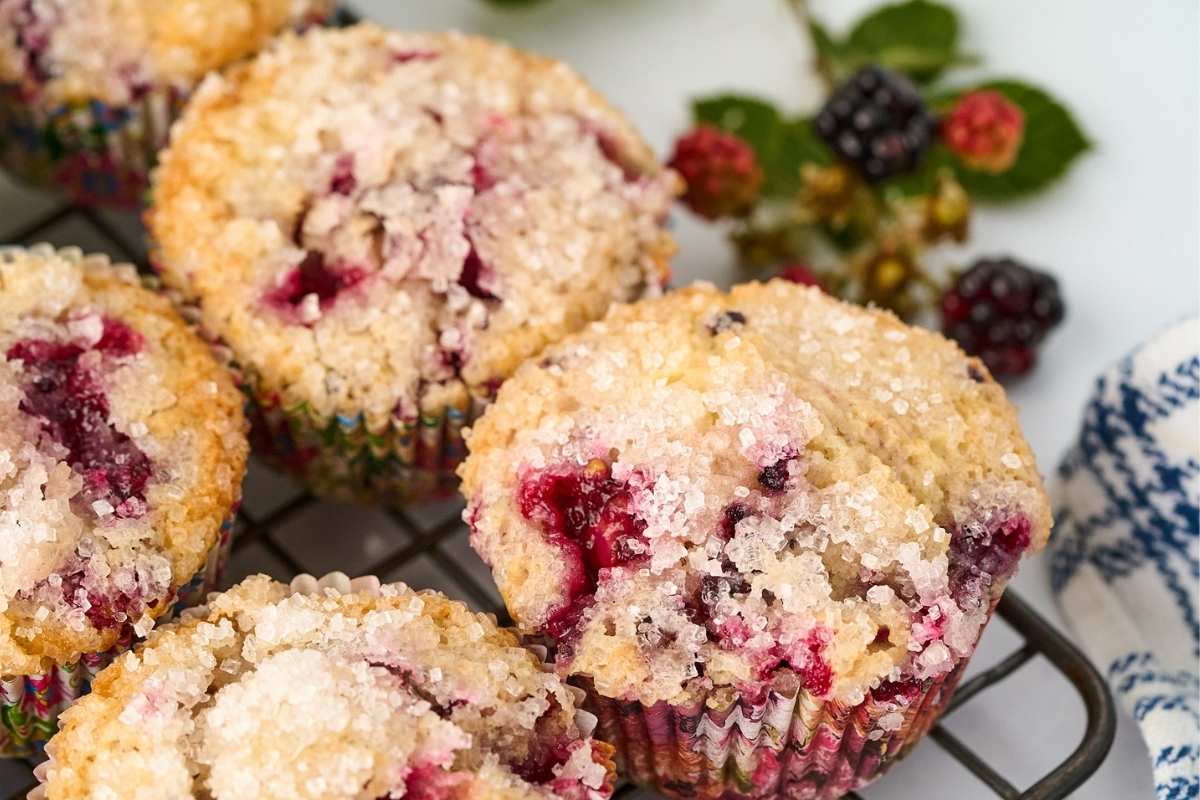 muffins on cooling rack with lots of sugar.