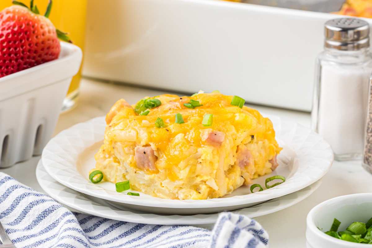 single serving of ham casserole on white plate.