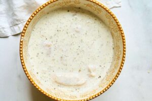 buttermilk marinate with chicken pieces.