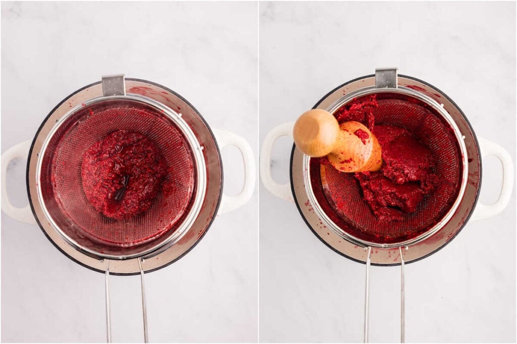 raspberry mixture strained with pestle over strainer.