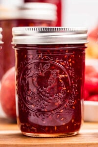 mason jar filled with peach raspberry jam