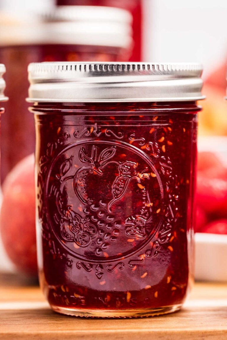 mason jar filled with peach raspberry jam