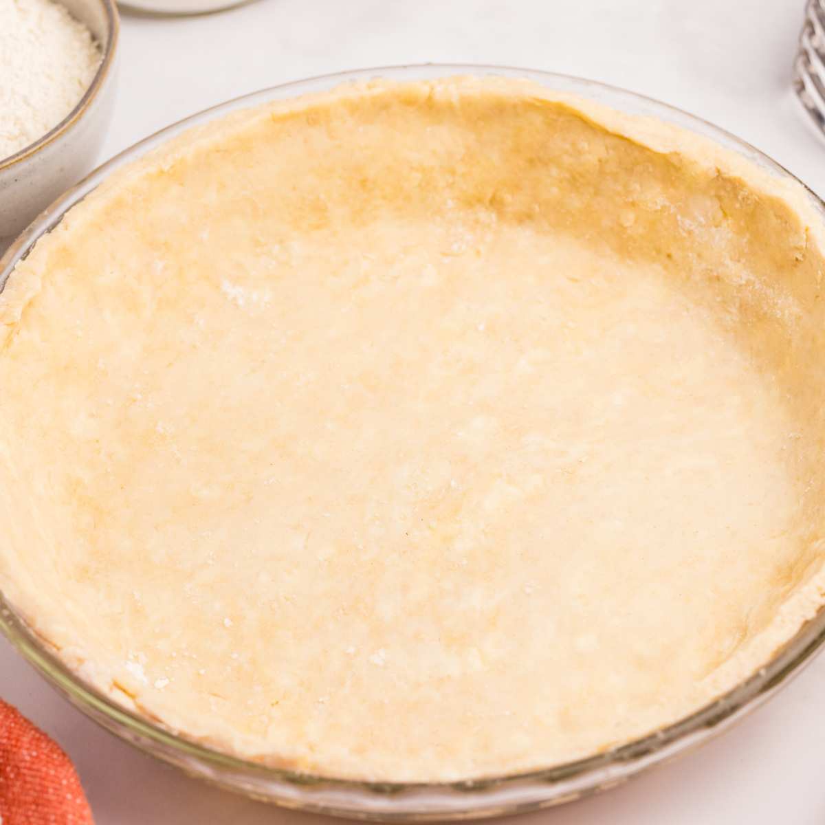 baked sourdough pie crust in pie plate.