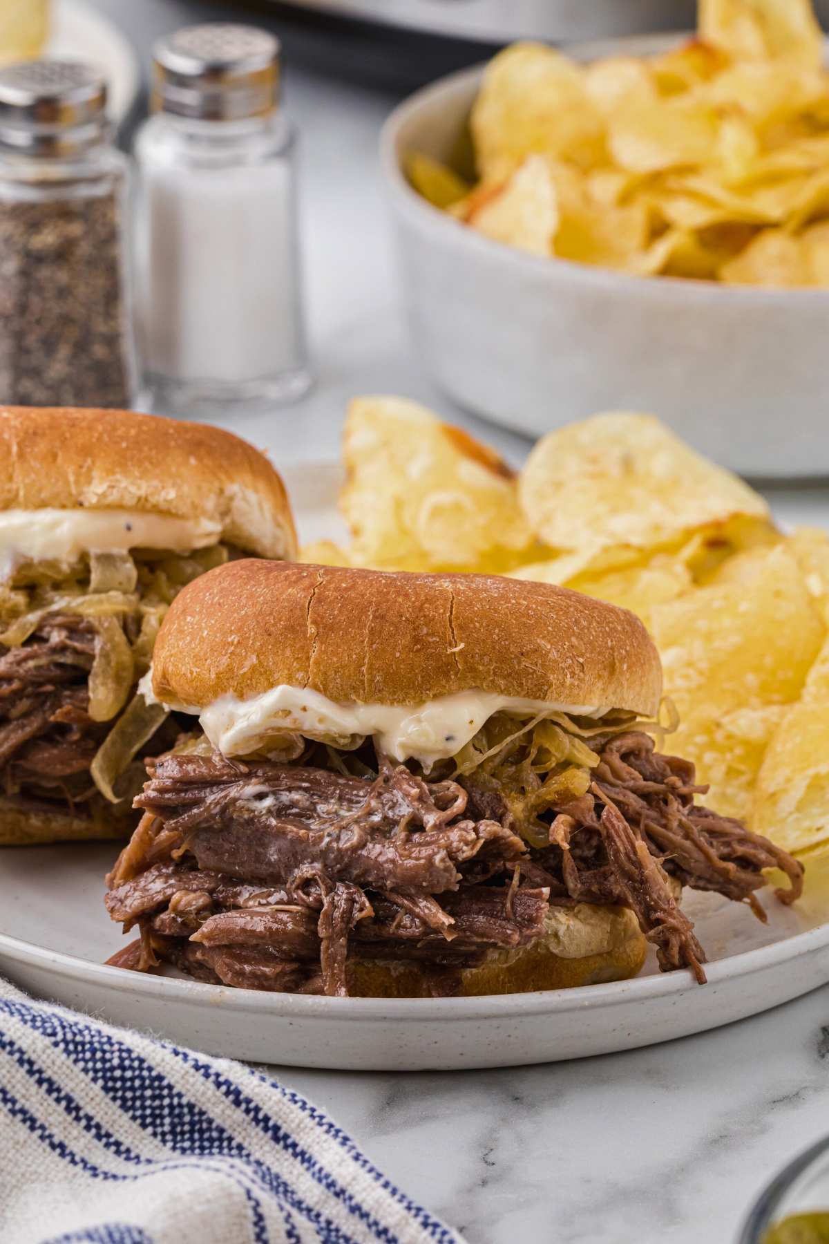 front shot of slider on plate with chips.