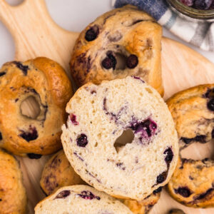 sliced blueberry sourdough bagel.