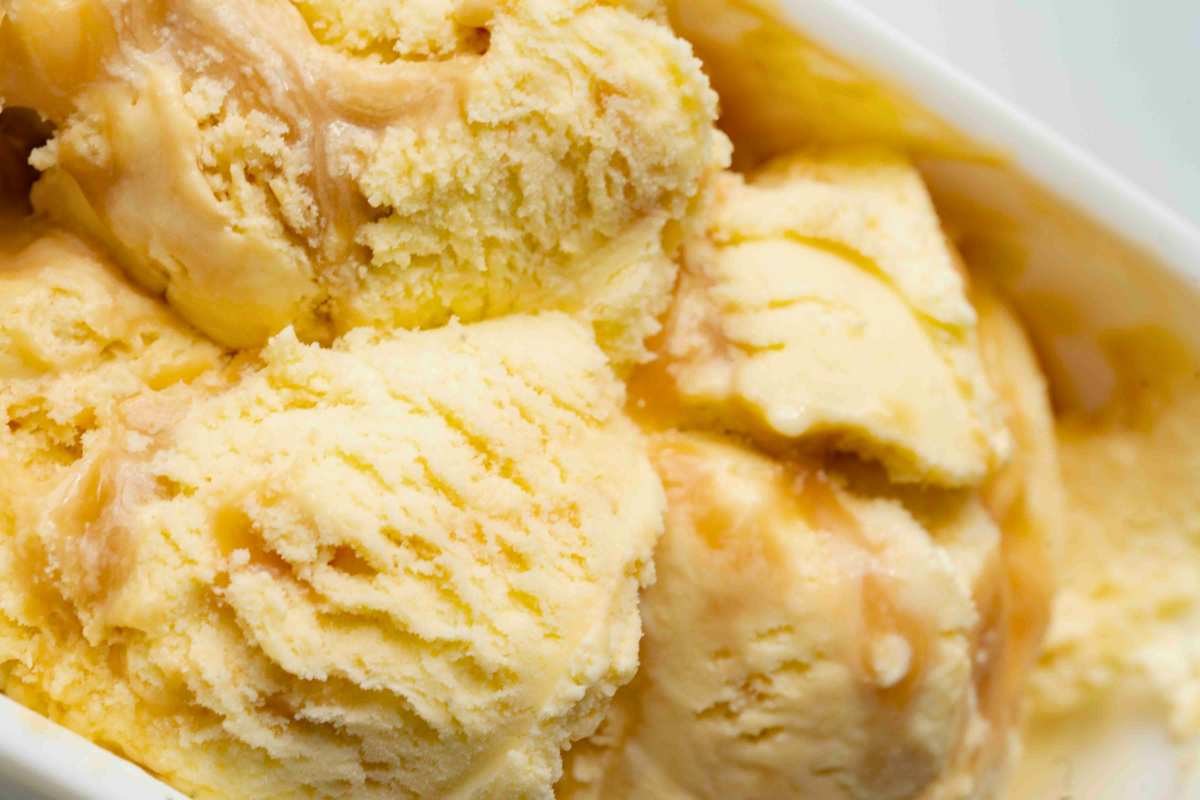 close up view of ice cream scoops in container.