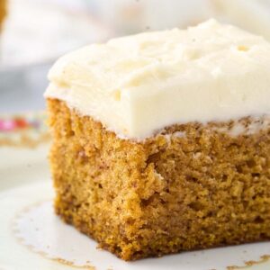 close up up view pumpkin cake on fall plate.