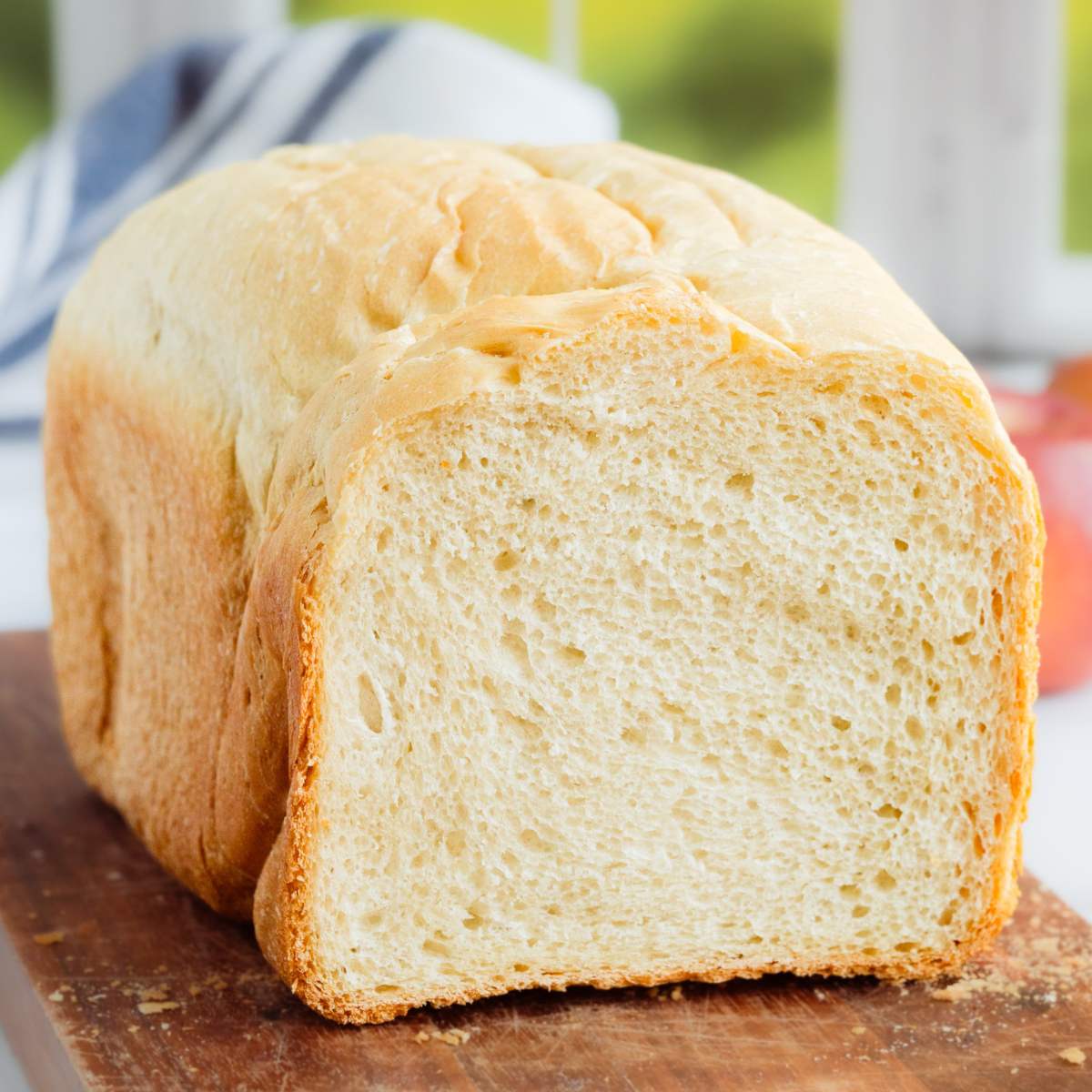 cut loaf of bread machine white bread.