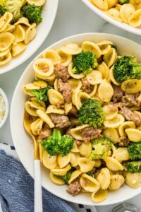 sausage broccoli pasta dish on plate.
