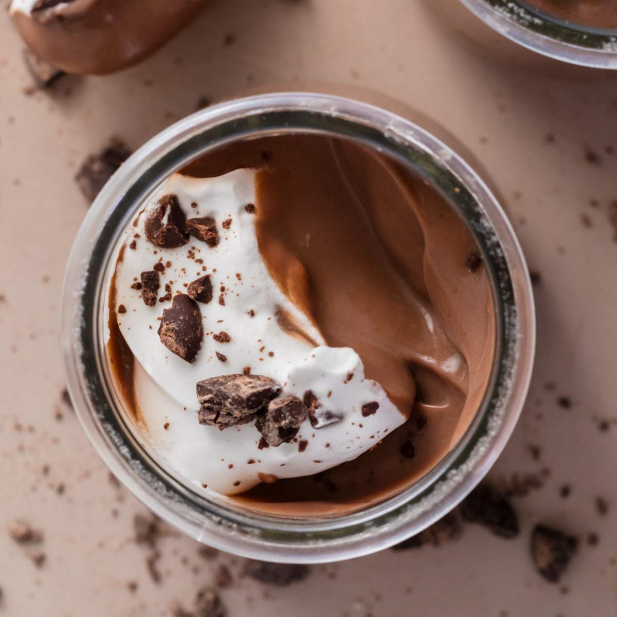 overhead view pudding with whipped cream.
