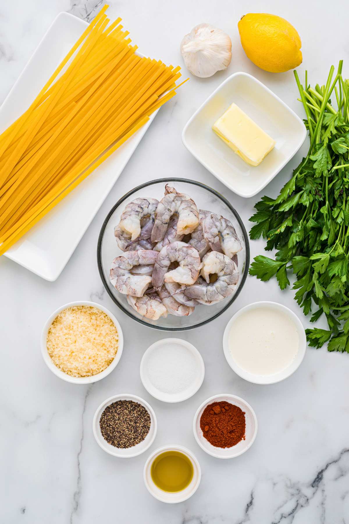 ingredients measured in bowls on counter.