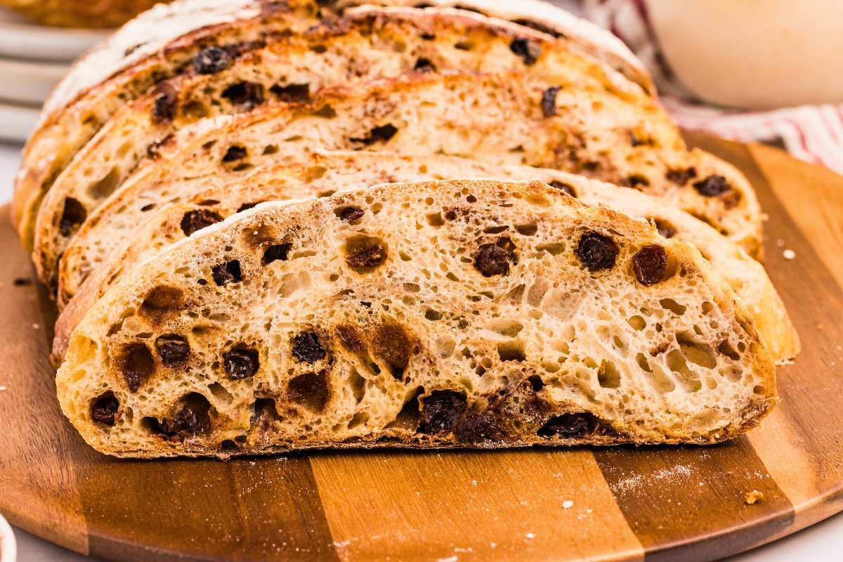 front view of bread slices on wooden board.