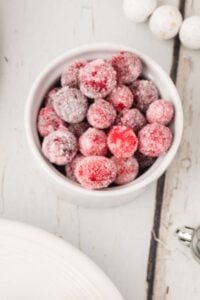 white counter of sugared cranberries.