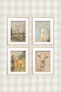 4 framed pictures of spring goats on plaid background.