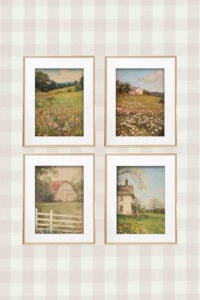Gallery of four spring-themed watercolor prints in gold frames featuring farm landscapes and rustic charm.