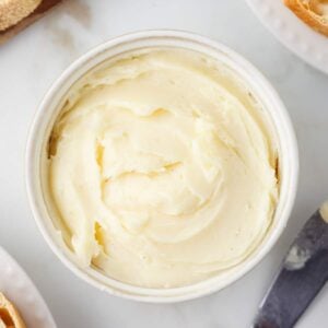 overhead view of small white butter container.