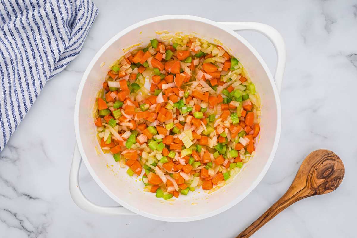 veggies cooking in pot.
